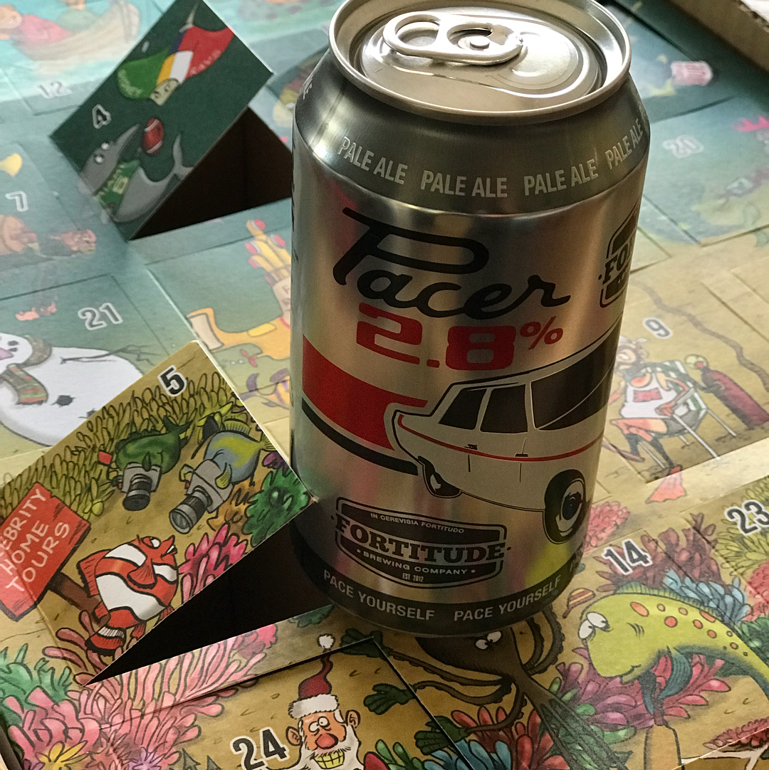 Can of Fortitude Brewery Pacer 2.8% pale ale on a colorful advent calendar with opened numbered flaps.