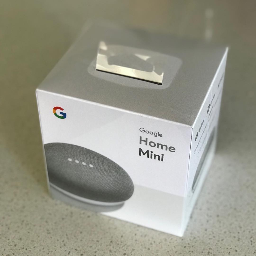 Box for a Google Home Mini smart speaker on a countertop.