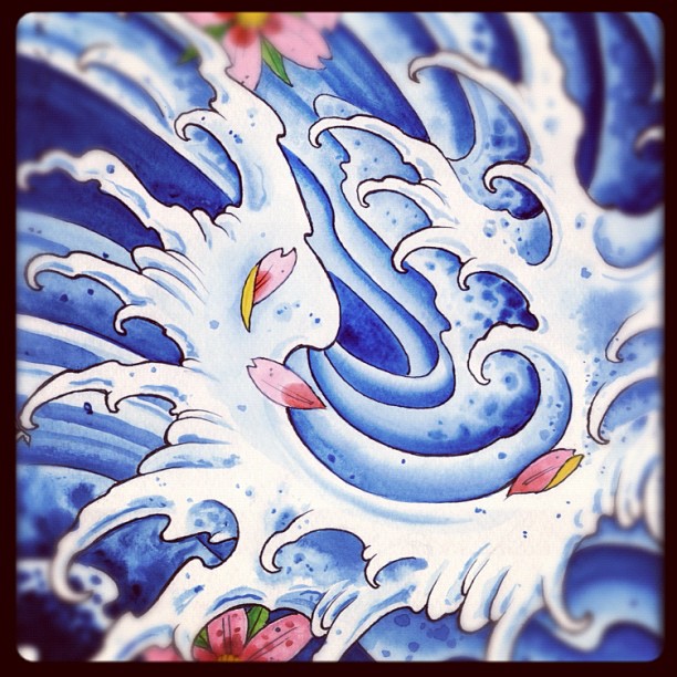 Stylized blue and white ocean waves with pink flower petals scattered among the foam.