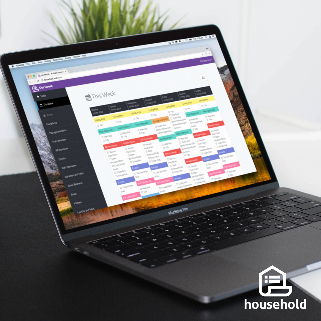 Open laptop on a desk displaying a weekly household chore schedule with colorful task blocks and a householder logo in the corner.