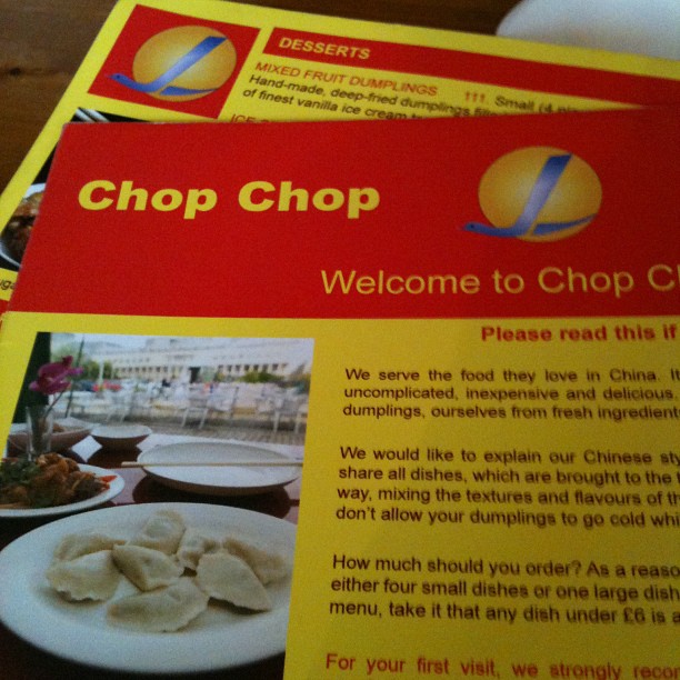 Red and yellow Chop Chop restaurant menu with logo, welcome text, and photos of dumplings and plates.