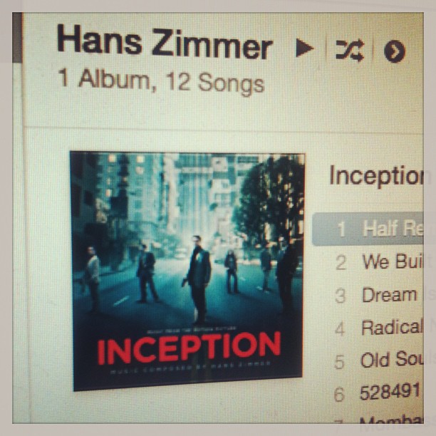 Music app screen showing Hans Zimmer with 1 album, 12 songs, and the Inception soundtrack cover beside a track list.