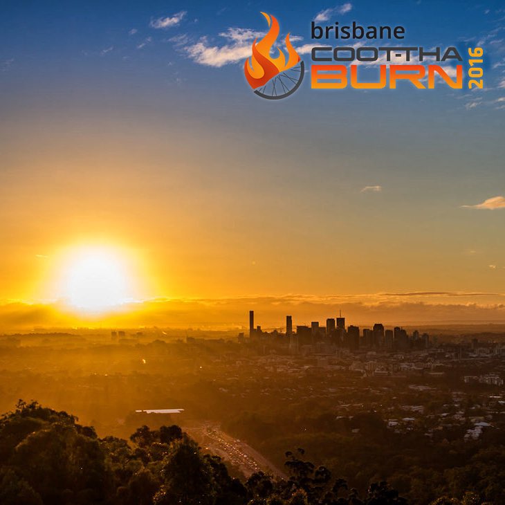 Sunrise over a city skyline viewed from a hillside, with a Brisbane Coot-tha Burn 2016 logo in the top right.