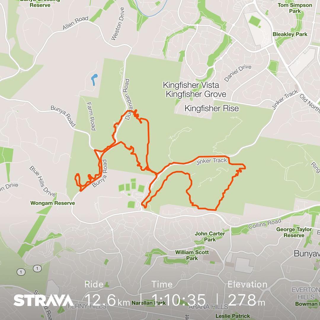Map with an orange running route around Bunya Road, Dugandan Road, and Jinker Track, showing 12.6 km, 1:10:35, and 278 m elevation.