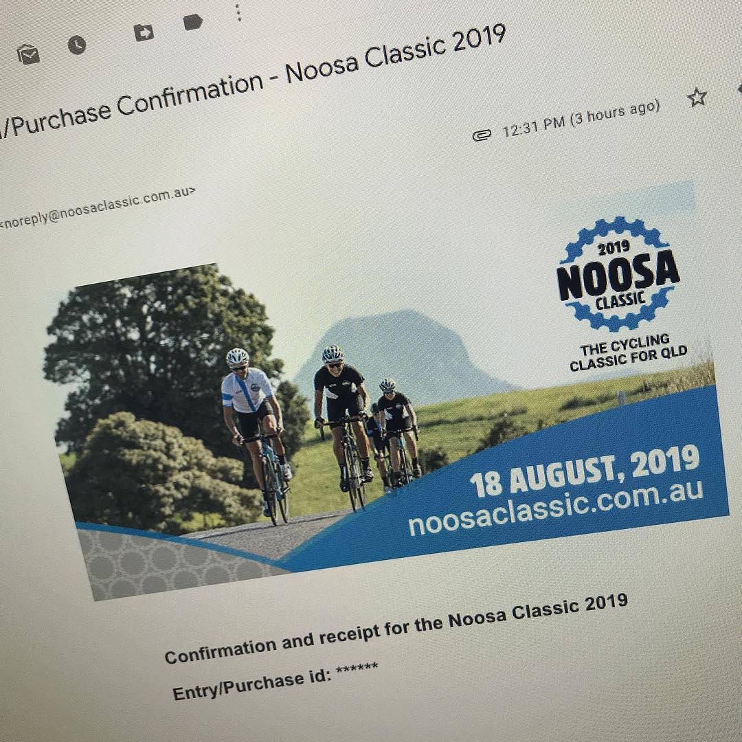 Email screen showing a Purchase Confirmation for Noosa Classic 2019, with a banner of three cyclists and the date 18 August, 2019.