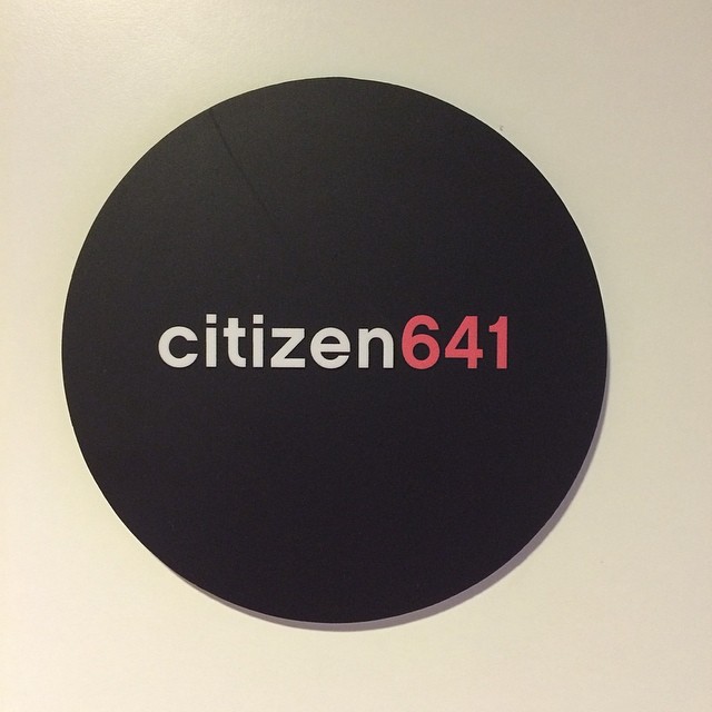 Black circular sign with the text “citizen641,” with “citizen” in white and “641” in red.