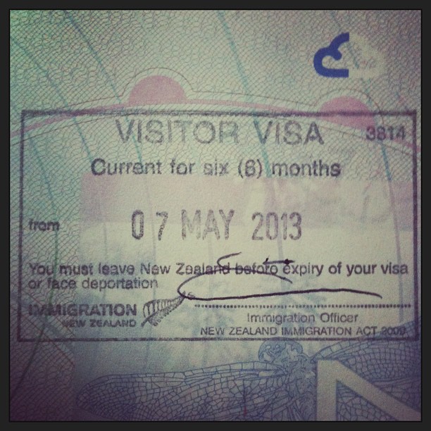 Close-up of a passport visa label reading “Visitor Visa,” valid for six months, dated 07 May 2013, from New Zealand Immigration.